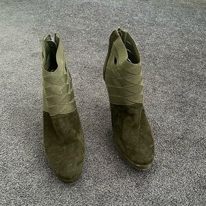 Size 10 Stuart Weitzman Black Papoose ankle boot.